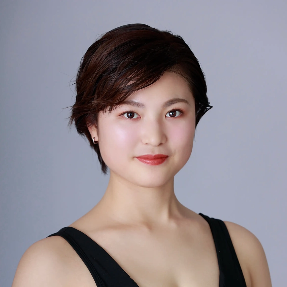津川 真優